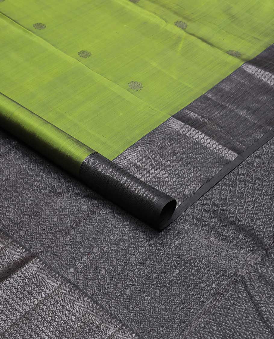 Green buttas kancheepuram silk saree with self border of thilakam mokku, muthu, banaras design & zari design pallu