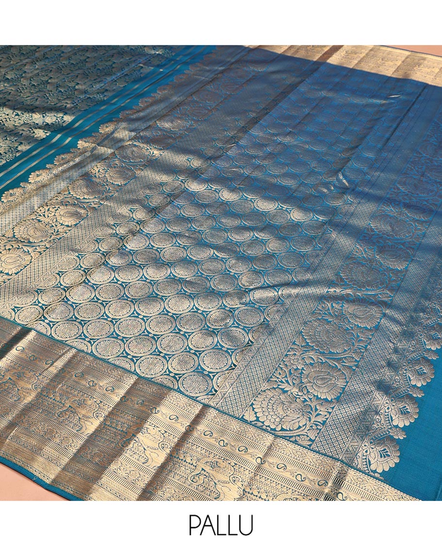 Blue Kanchipuram Wedding Silk Saree, Meticulously Crafted with Jacquard Design on Its Body, Highlighted by Zari Border of Cross Kamalam, Kodi Manga, Muthu, Kathir, Mayil Kann, and Yaali Designs, Chakram Design Pallu, and Paired with a Matching Blouse