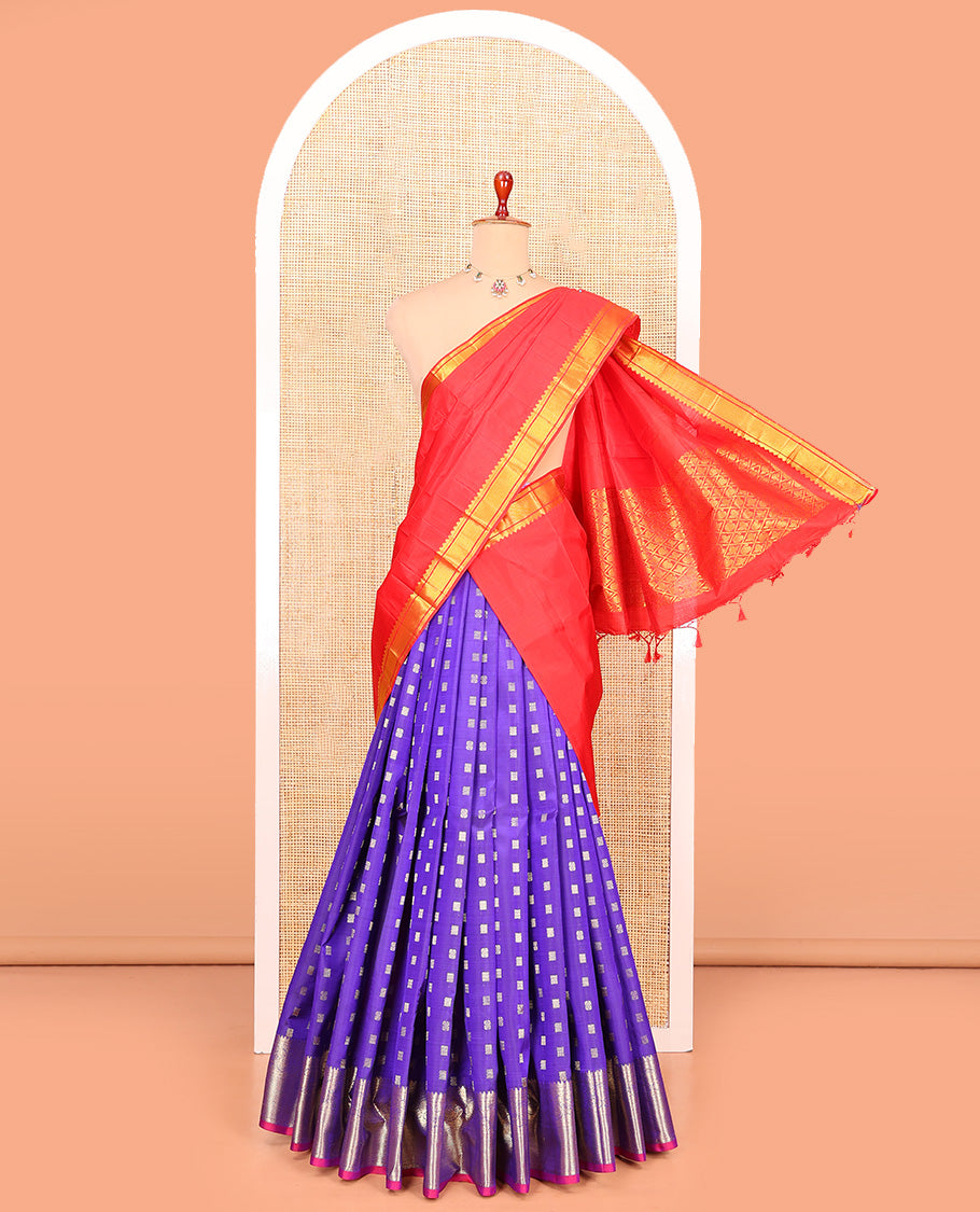 Dark Violet Pure Silk Half-Saree Beautified with Zari Buttas on Its Skirt, Complemented by a Zari Border Featuring Thilakam Mokku, Rettai Nelli, and Mayil Kann Designs, Comes with a Contrast Blouse and a Dhavani of Butta Enclosed Jaal Designs