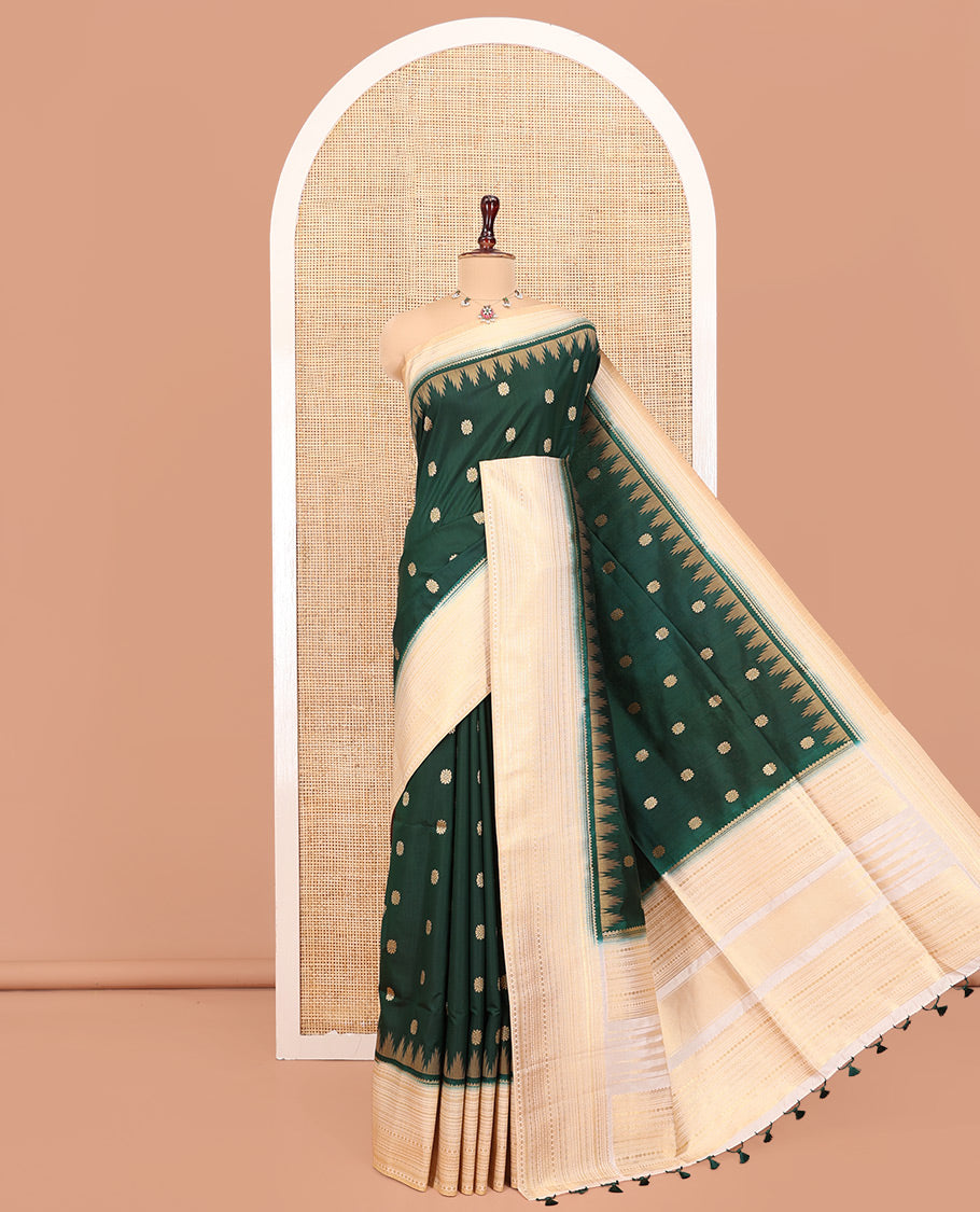 Bottle Green Dupion Silk Saree, Elevated with Zari Buttas All Over Its Body, Complemented by a Contrast Temple Traditional Zari Design Woven Border, Traditional Pallu of Temple Designs, and Paired with a Contrast Blouse