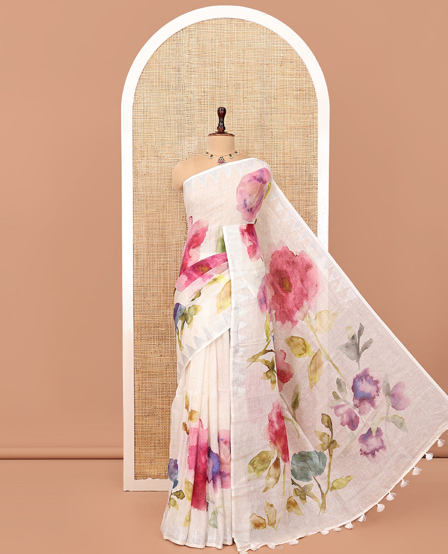 Cream-Base Linen Saree, Highlighted by Floral-Themed Paint Splashes, Hand-Brush Painted All Over Its Body, Sparsely Woven Temple Border, and Paired with a Matching Blouse