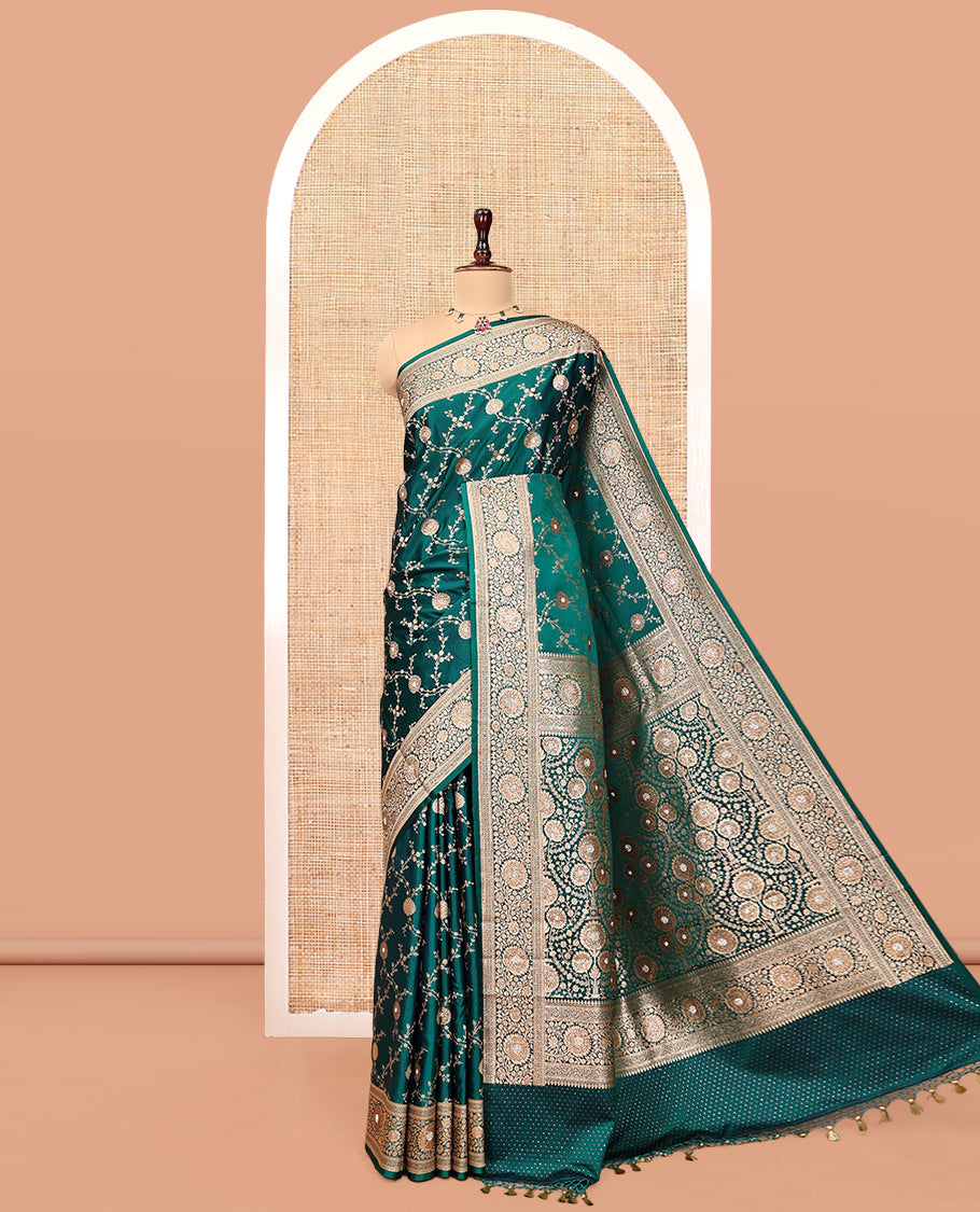 Green Banarasi Satin Saree, Embellished with Floral Jaal Jacquard, a Floral Creeper Border, Intricate Stonework Pallu, and a Matching Blouse