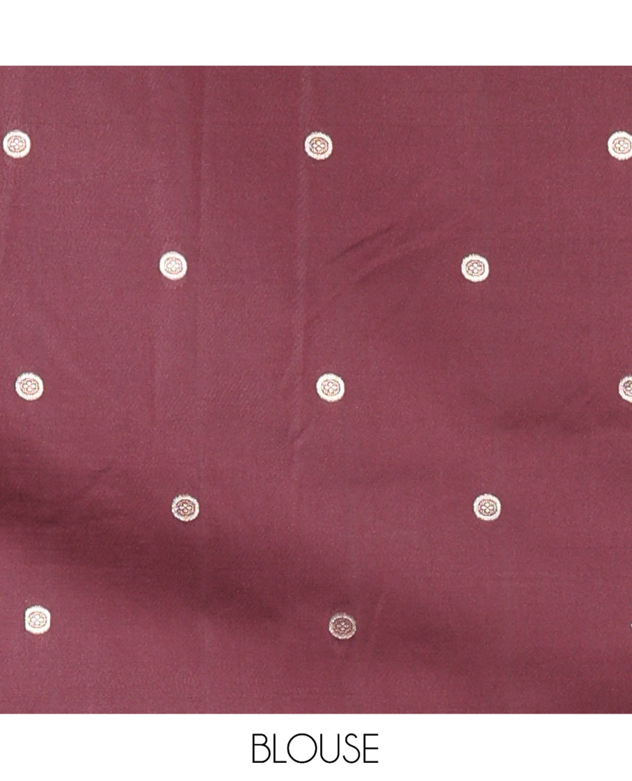 Brown Kanchi Soft Silk Saree, Elevated with Zari Buttas All Over Its Body, Highlighted by Traditional Zari Rettai Pettu Chakram Border, Intricately Designed Jaal Pallu, and Paired with a Matching Blouse