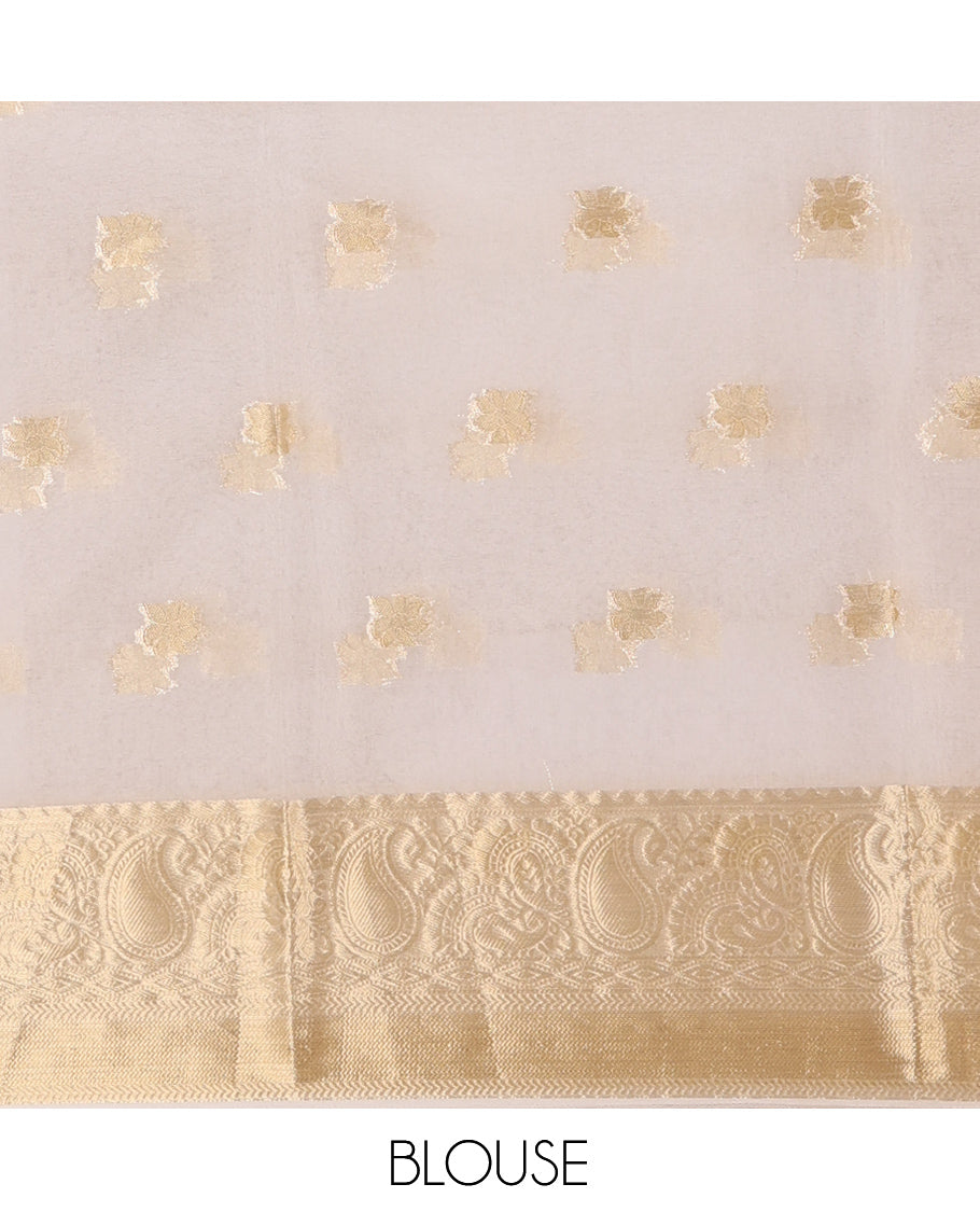 Cream Semi-Organza Saree, Masterfully Woven with Zari Buttas, Highlighted by a Zari Paisley Border, and a Matching Blouse