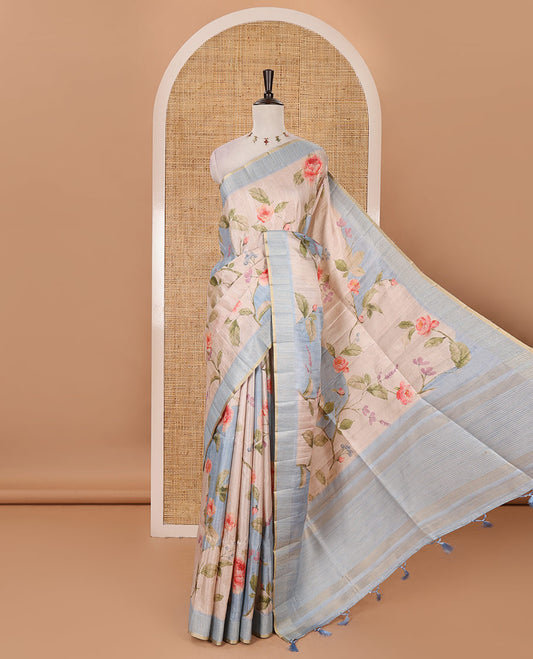 Sky blue floral-leaf printed fancy tussar silk saree, zari woven border & zari striped pallu & matching stripes & floral printed blouse