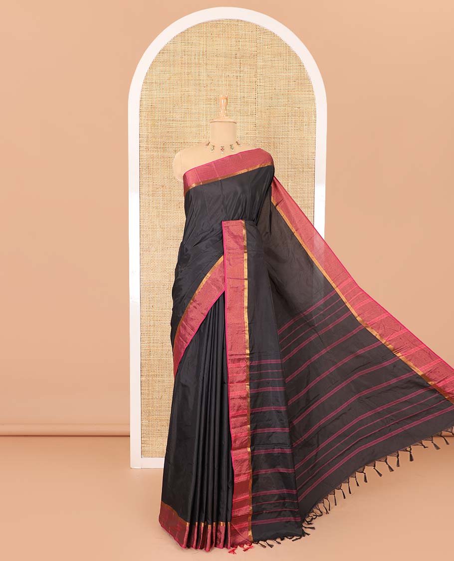 Black plain design semi-soft silk saree, contrast satin striped border, striped pallu, and a matching blouse