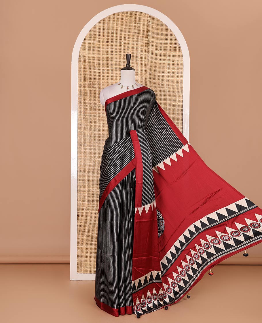 Black vertical striped gaji silk saree, contrast plain border, ajrakh printed pallu and contrast plain blouse