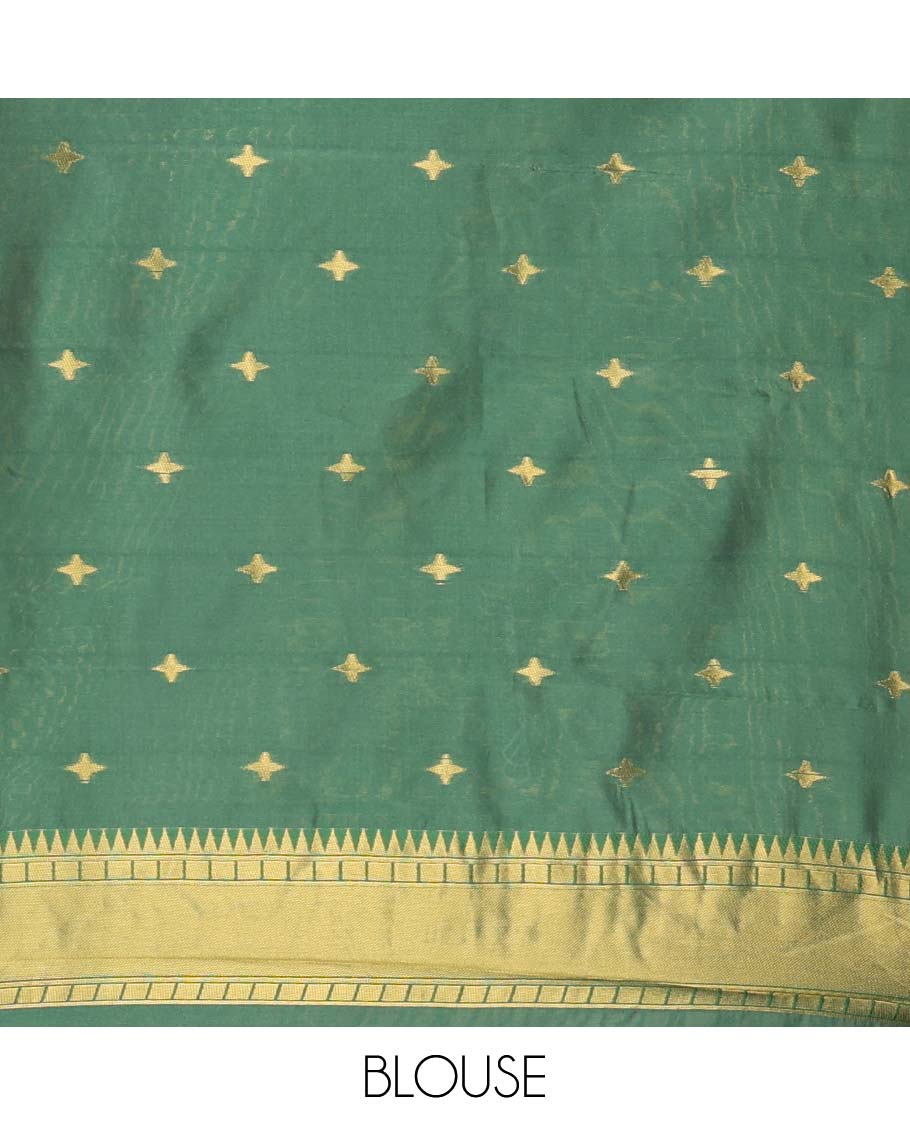Cream with green temple butta kanchi silk saree with temple, traditional zari border & rich weaving pallu along with butta design blouse