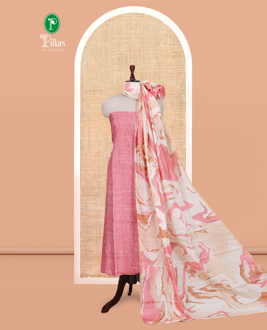 Peach Semi-Bhagalpur Cotton Material Churidar Features Plain Top, a Santoon Bottom, and Contrast Abstract Printed Dupatta
