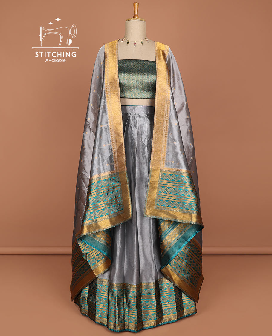 Grey half saree with self zig zag striped border, zari design blouse & floral zari design dhavani