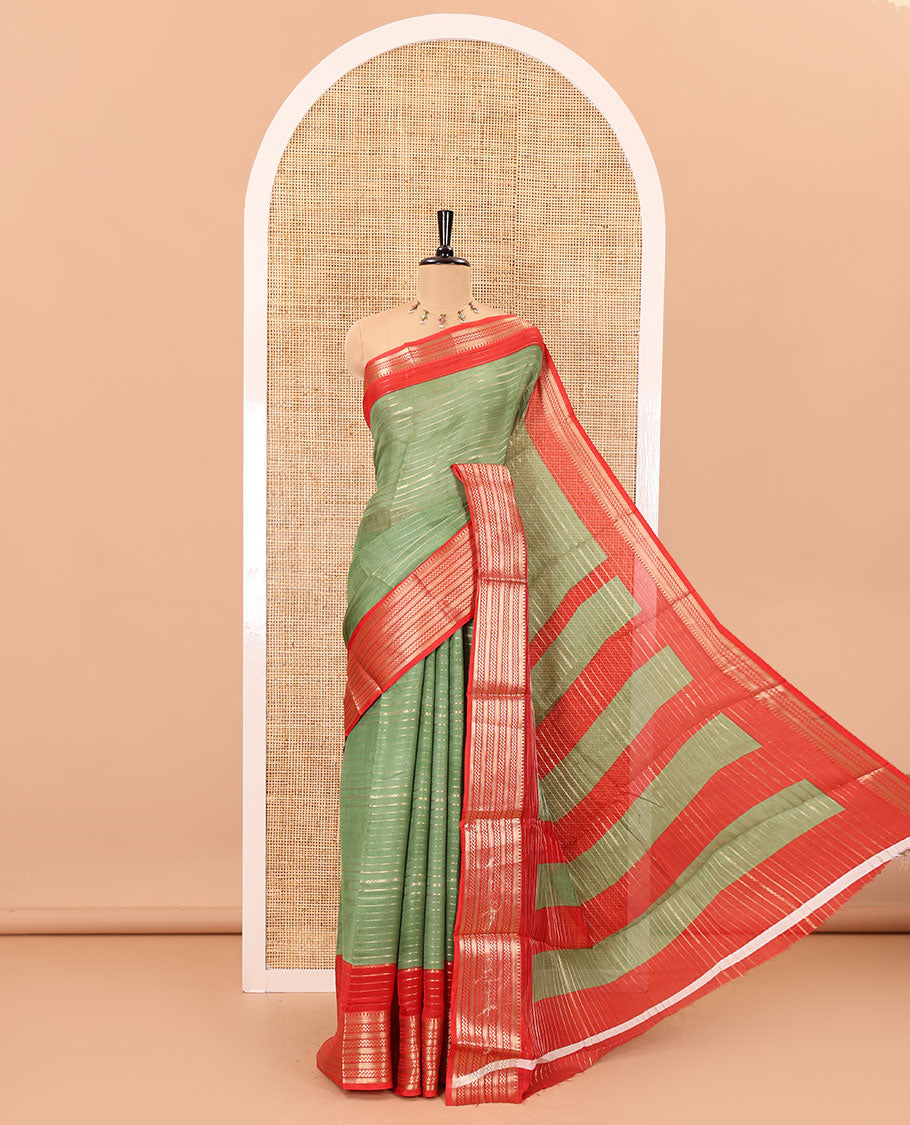Green horizontal zari striped moss chiffon saree, contrast traditional zari border, striped pallu, and a contrast zari design blouse