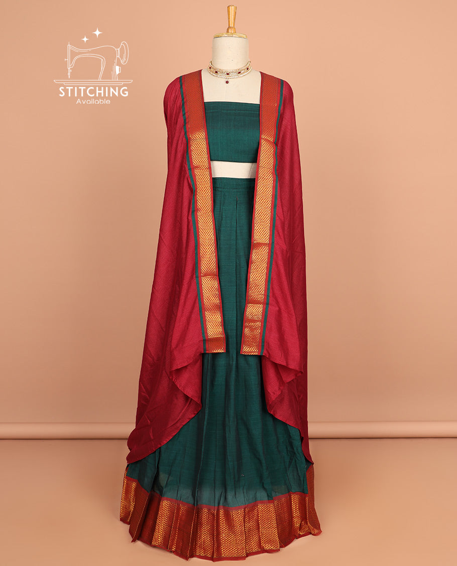 Green cotton half saree with contrast peacock motifs border, plain blouse & plain dhavani with striped design border