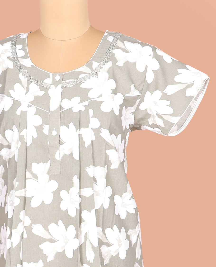 Light Grey Cotton Nighty Delicately Decked Up with Silhouette Floral Motifs Print, Featuring Lace Work, Round Front Neck, and Half Sleeves