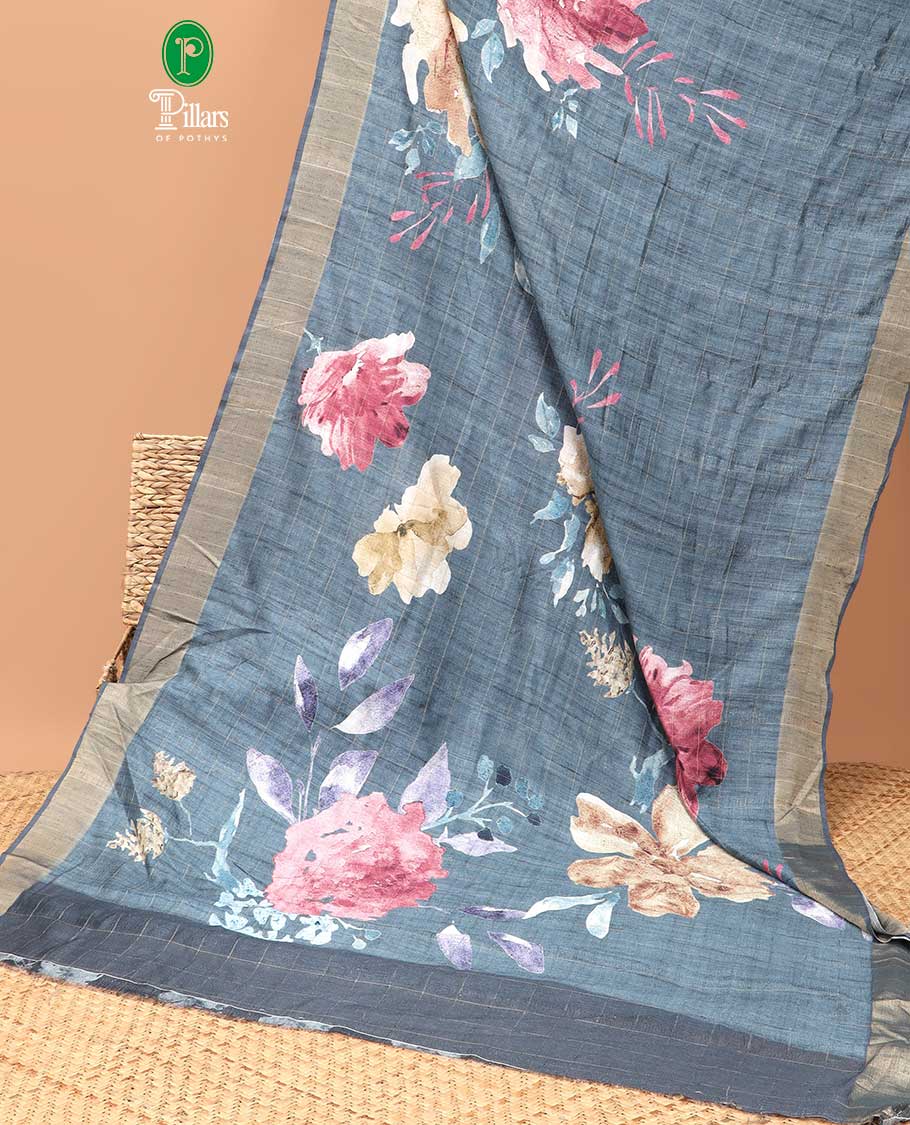 Grey checks with floral printe semi tussar saree, gold zari bawanchi border & printed pallu along with checked blouse
