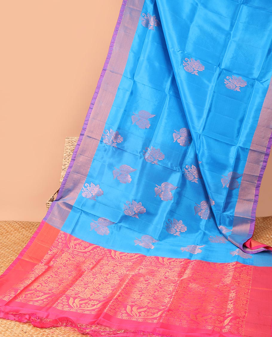 Blue flower motifs semi-uppada saree with contrast zari border & floral zari design pallu