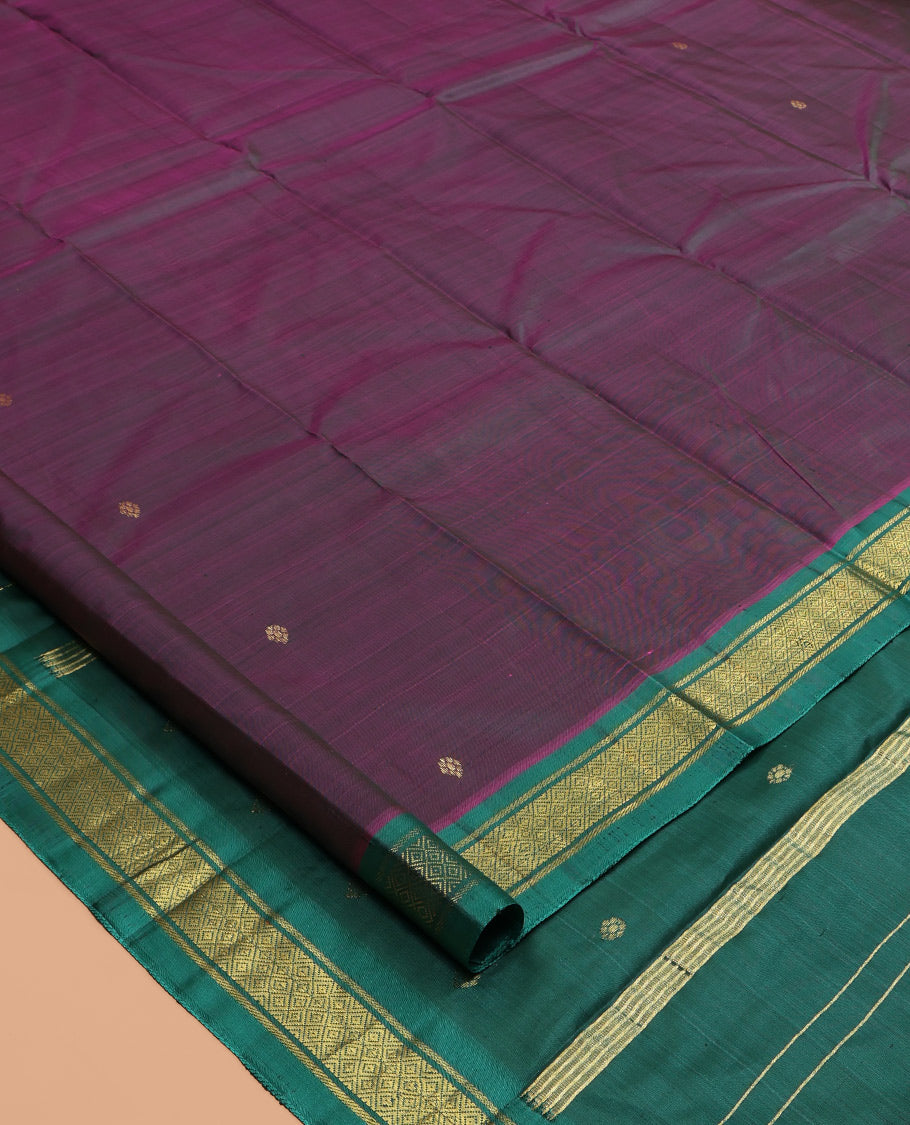 Wine Kanchipuram Silk Saree, Woven with Zari Buttas, a Contrast One-Sided Border of Banaras, and Mayil Kann Designs, Zari Design Pallu, and No Blouse
