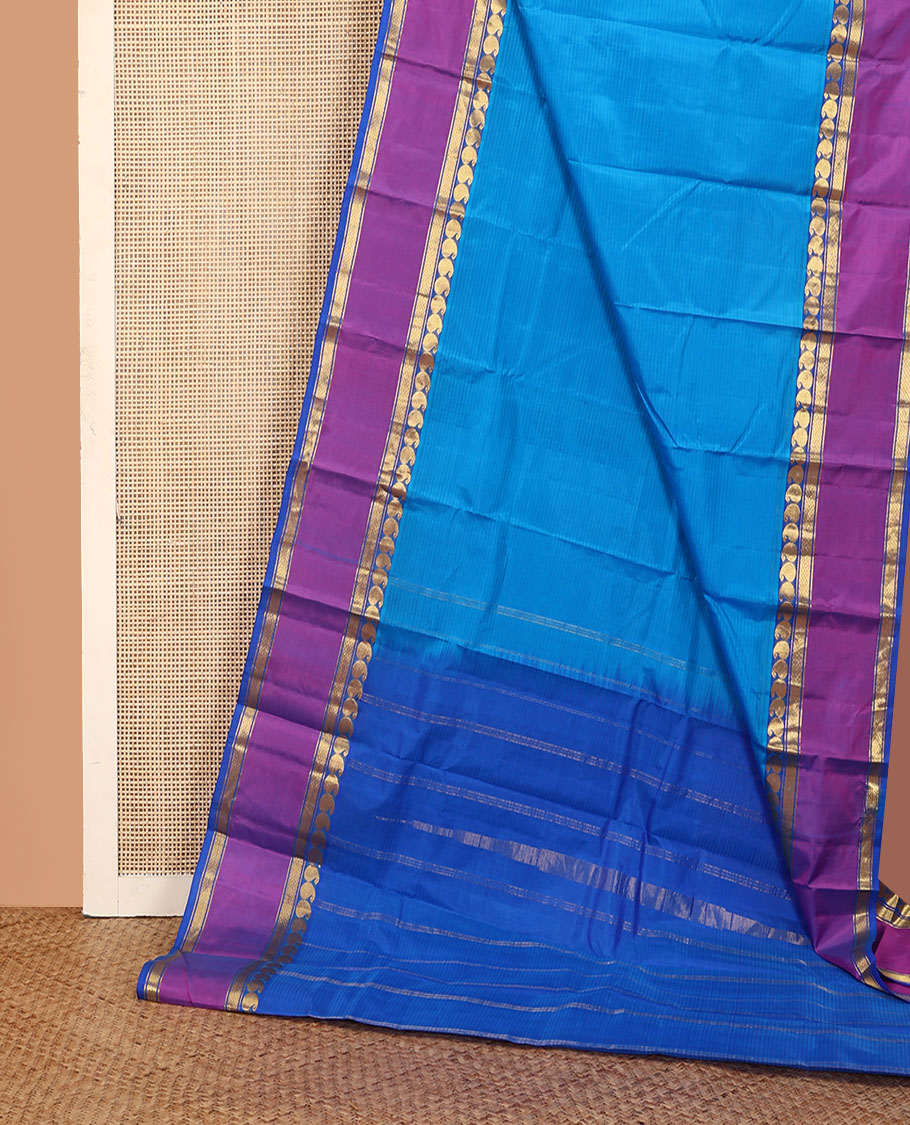 Blue striped Kanchipuram silk saree, contrast rettai pettu border of manga, and mayil kann designs, and zari design pallu