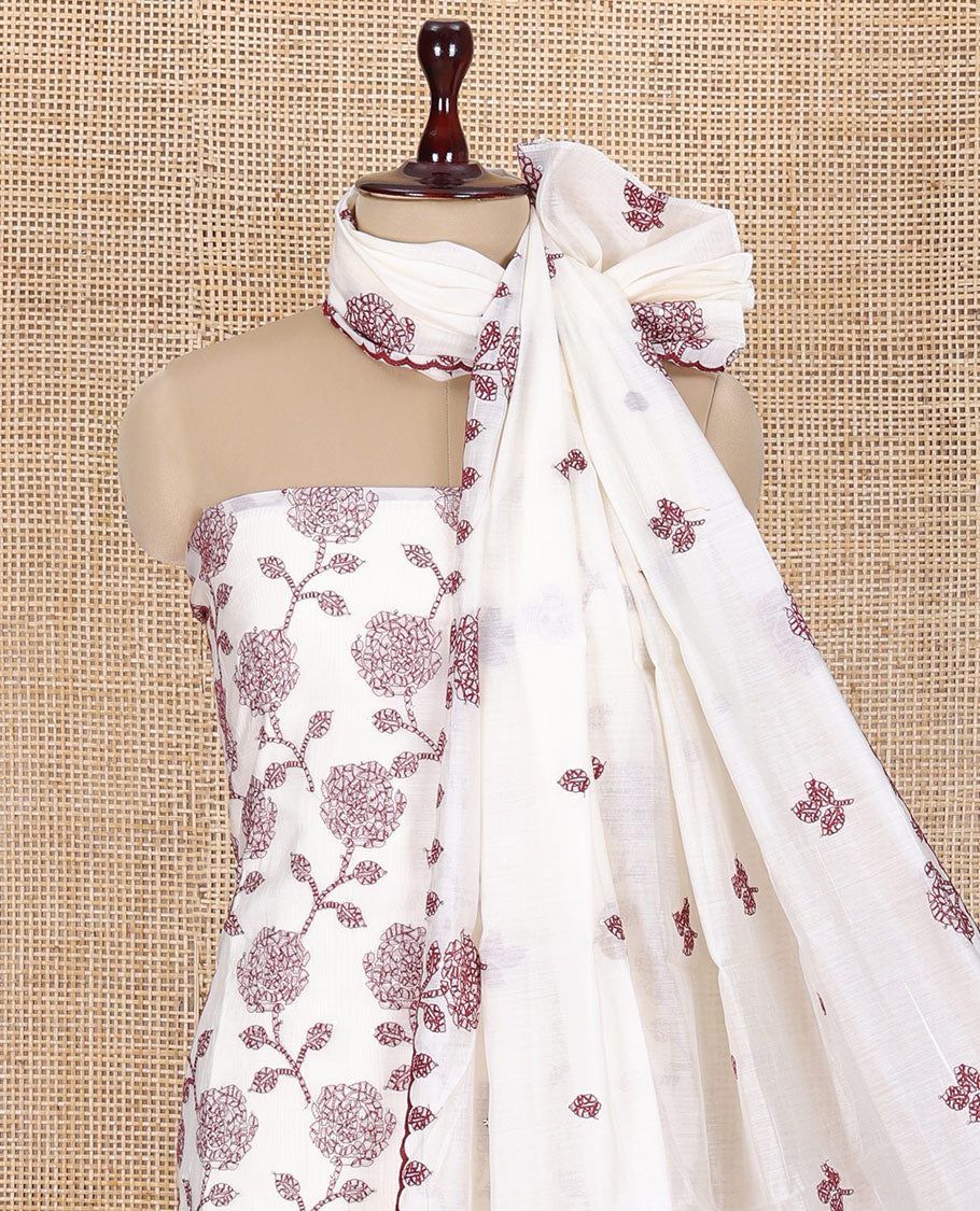 Cream Mul Chanderi Material Churidar Features Floral Vine Embroidery Top, a Plain Bottom, and a Embroidered Dupatta