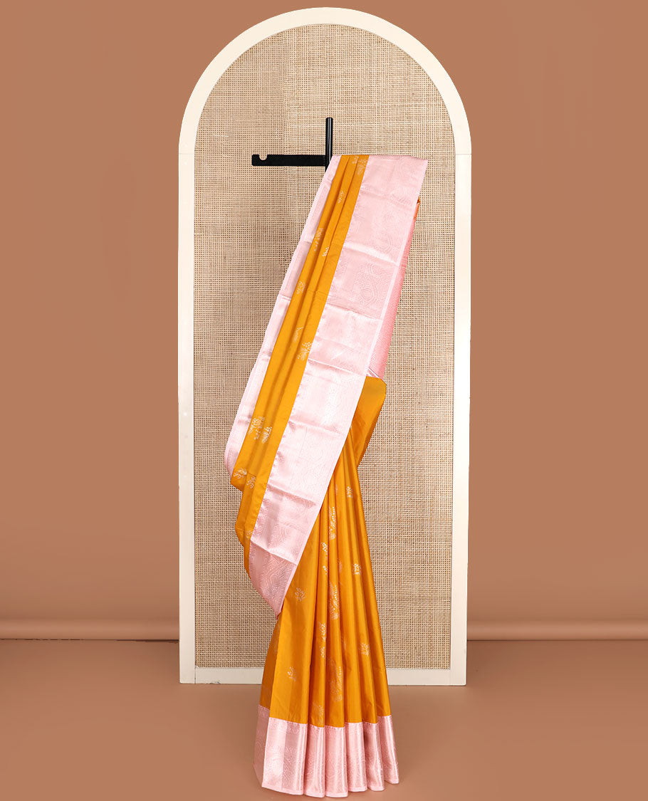 Yellow zari buttas gift saree, contrast traditional zari border, and pallu of ogee pattern