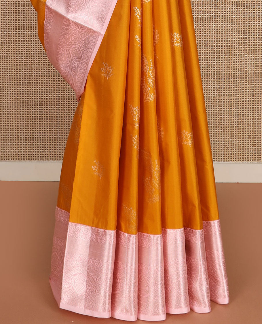 Yellow zari buttas gift saree, contrast traditional zari border, and pallu of ogee pattern