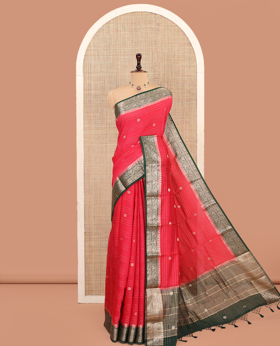 Red Assam Silk Saree, Embellished with Zari Stripes and Zari Buttas, Complemented by Contrast Zari Border of Floral Creeper Designs, Pallu Depicts Zari Designs, and Paired with a Contrast Blouse