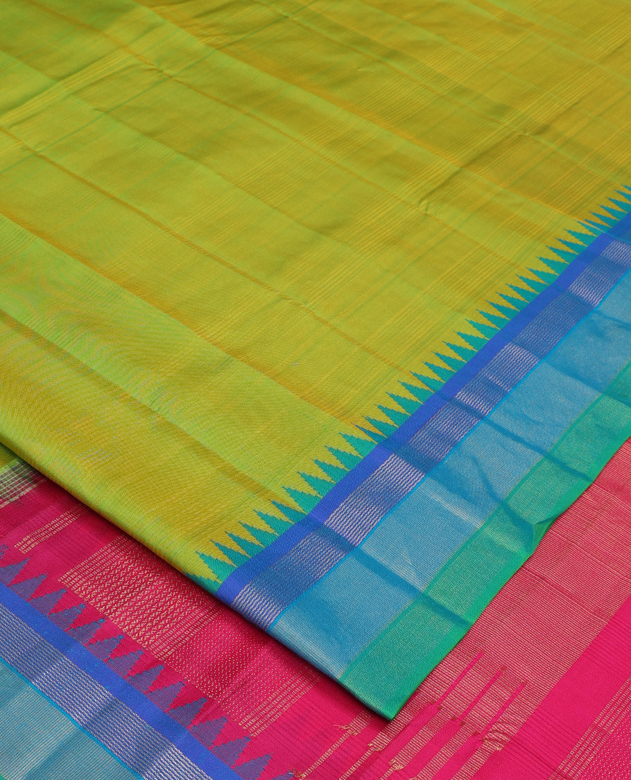 Green striped Bangalore silk saree, contrast ganga jamuna temple border, and temple design pallu