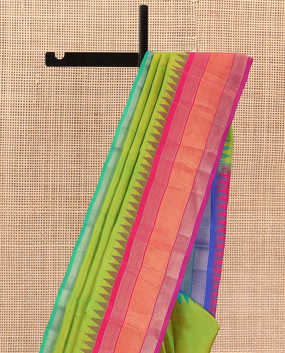 Green striped Bangalore silk saree, contrast ganga jamuna temple border, and temple design pallu