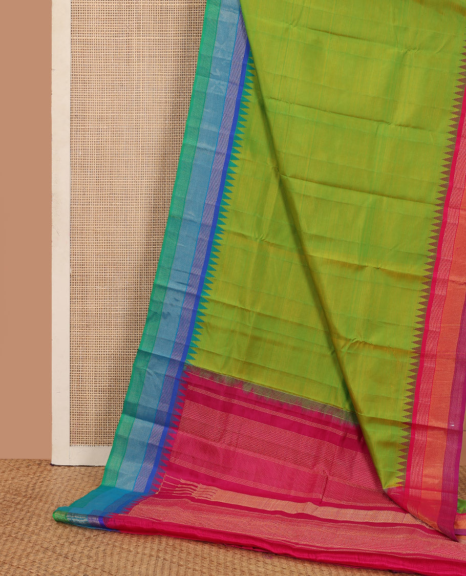 Green striped Bangalore silk saree, contrast ganga jamuna temple border, and temple design pallu
