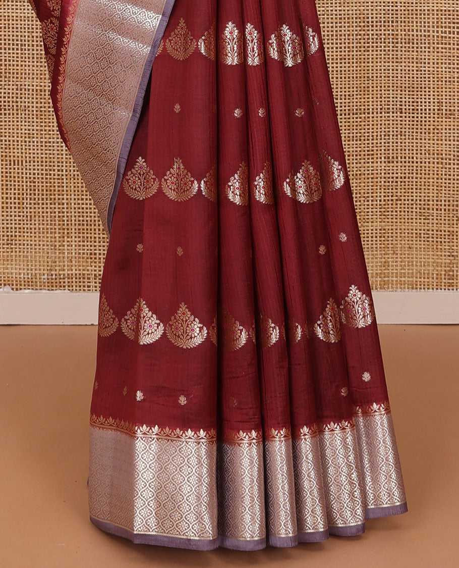 Maroon floral meena buttas raw mango silk saree, contrast floral ogee patterned border, and floral design pallu