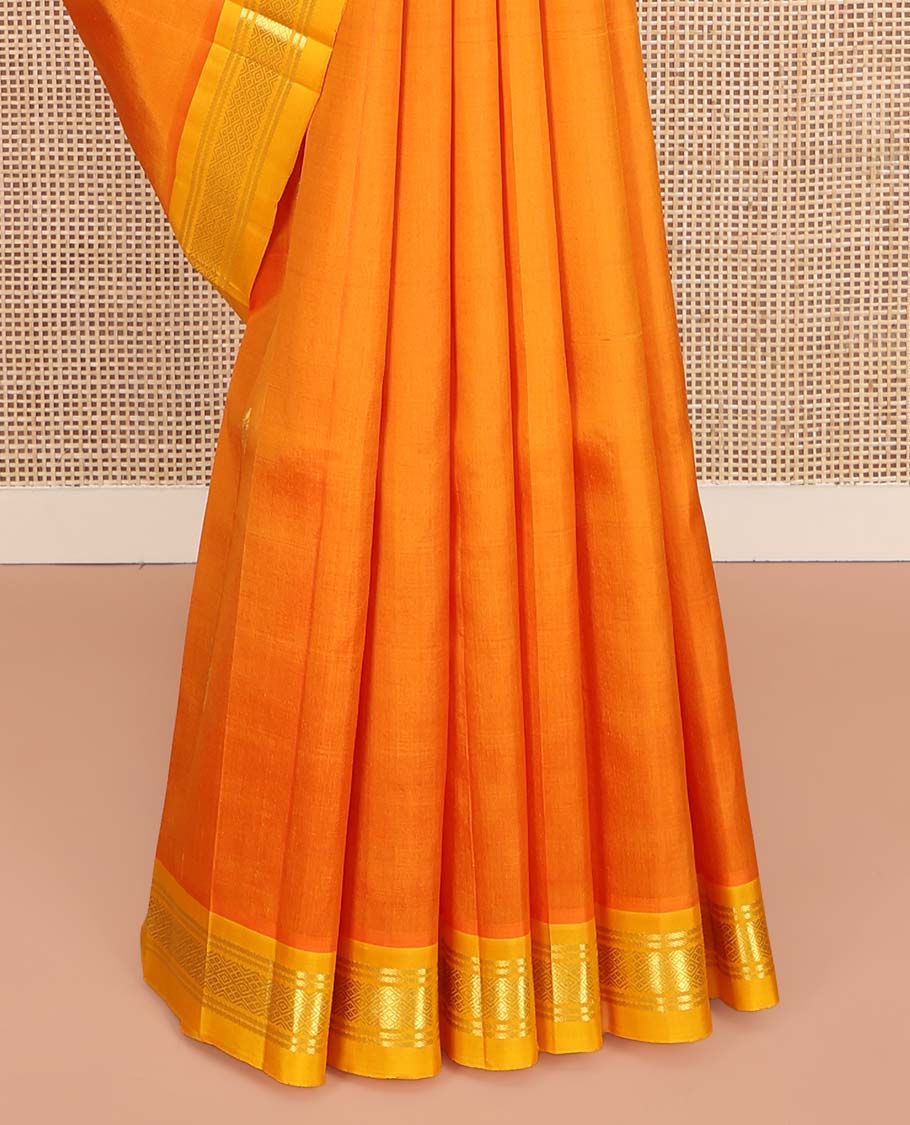 Orange Kanchipuram Silk Saree, Bedecked with Zari Buttas on Its Body, Complemented by a Contrast Zari One-Sided Border of Banaras, and Jaal Designs, Pallu of Zari Designs, and Comes Without a Blouse