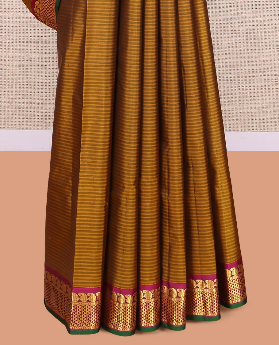 Brown Kanchipuram Silk Saree, Elevated with Vazhaipoo Stipes and Zari Buttas, a Contrast Ara Madam and Manga Motif Border, Pallu of Zari Design, and Contrast Blouse