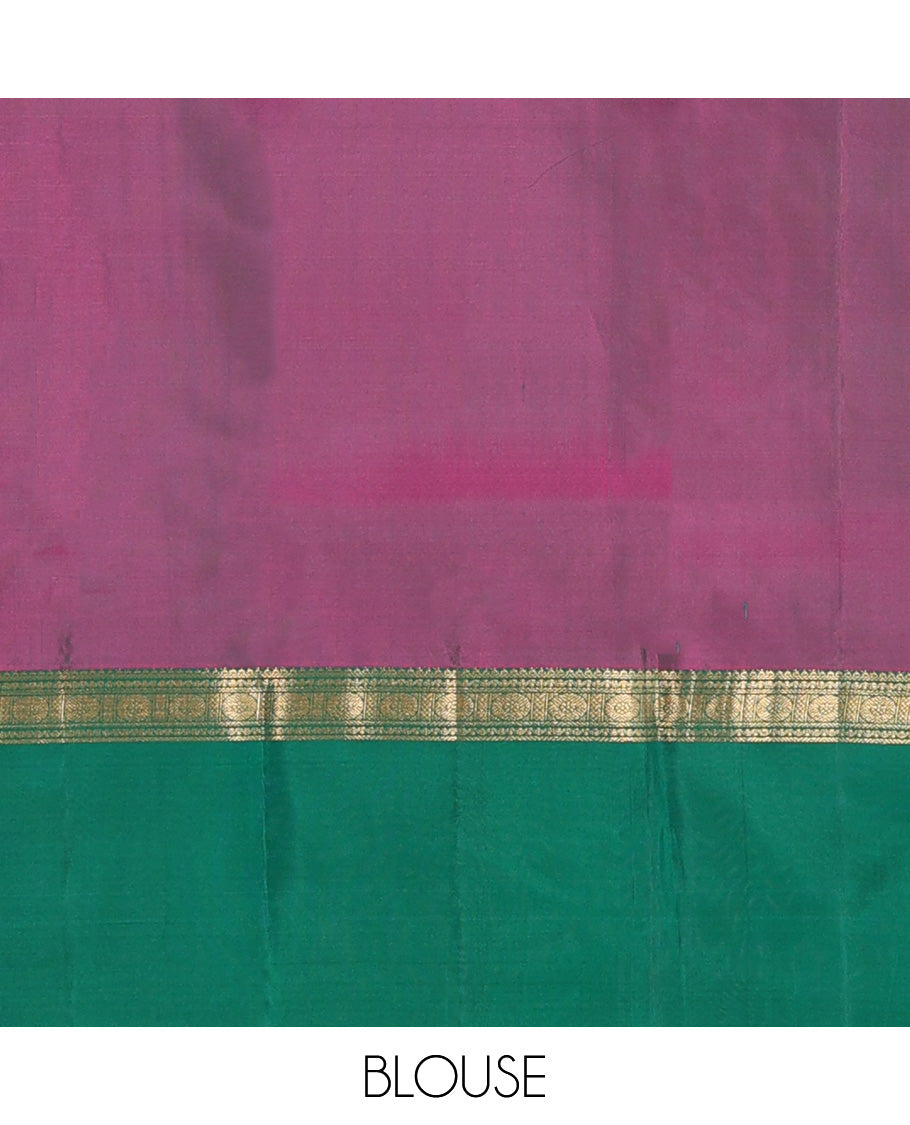 Green plain Kanchipuram silk saree, contrast ganga jamuna rettai pettu border of rekku, neli, banaras, and rudraksham designs, and pallu of kathir, rudraksham, neli, poun, ara bogudi, and ara maadam