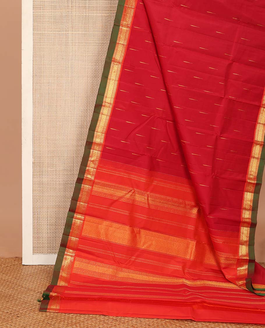 Red malli mokku buttas Kanchipuram silk saree, contrast border of rekku, banaras, and mayil kann designs, and traditional design pallu