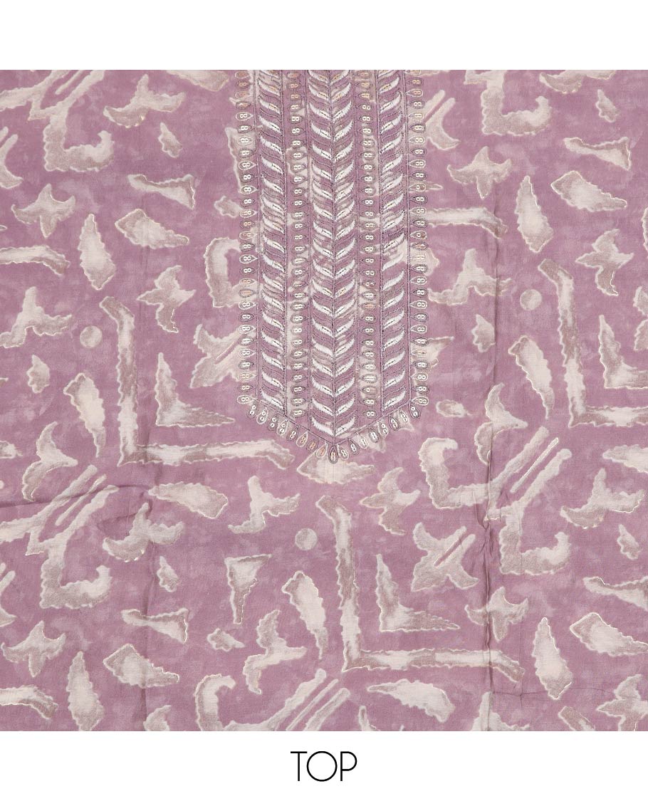 Lavender material chudidar set, uniquely printed with neck self color thread embroidered top, plain bottom and sequins embroidered dupatta