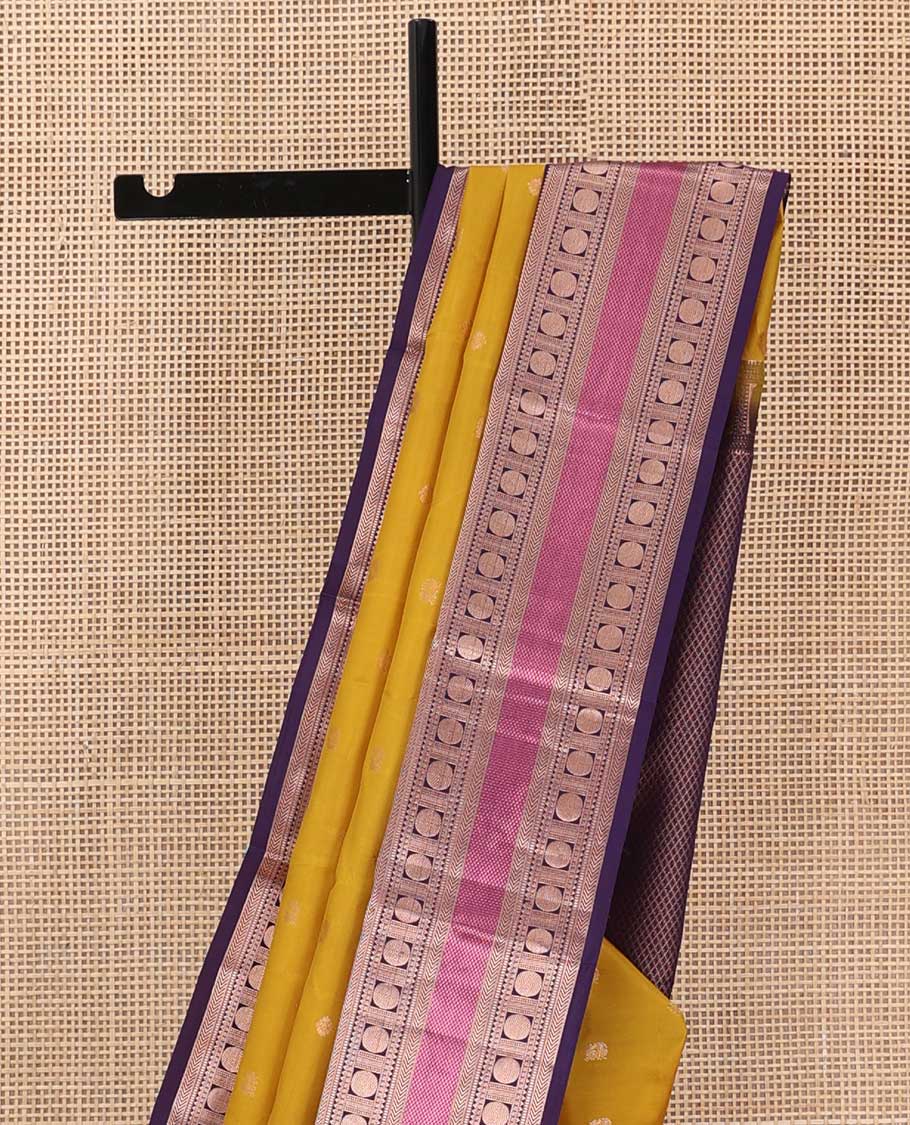 Yellow zari buttas silk saree, contrast border of thilakam,kathir, rudraksham, and mayil kann, and jaal pallu