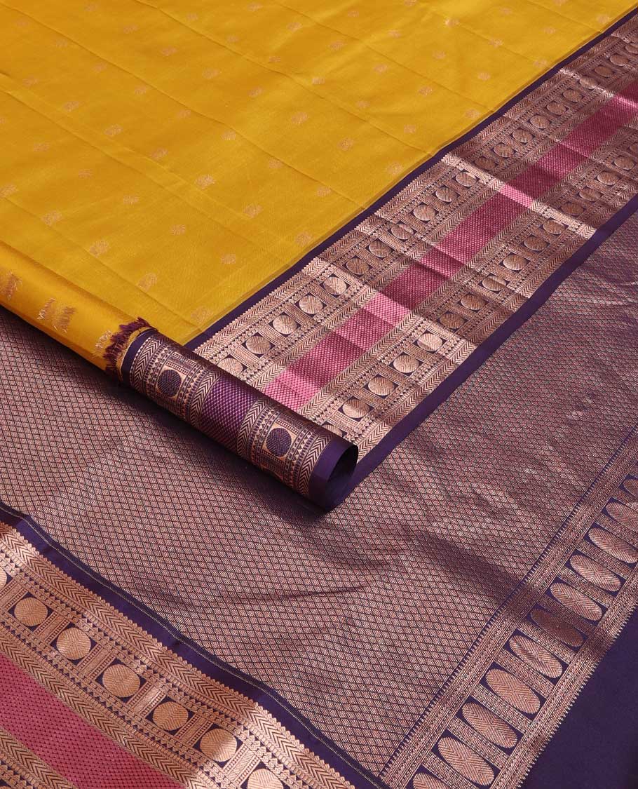 Yellow zari buttas silk saree, contrast border of thilakam,kathir, rudraksham, and mayil kann, and jaal pallu