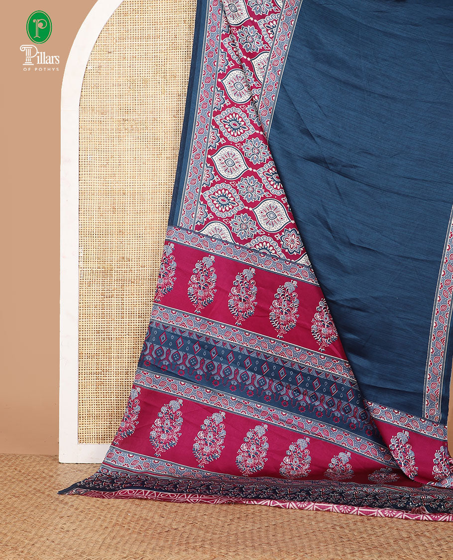 Blue half-&-half style modal satin saree features floral & geometric design ajrakh printed contrast border & pallu
