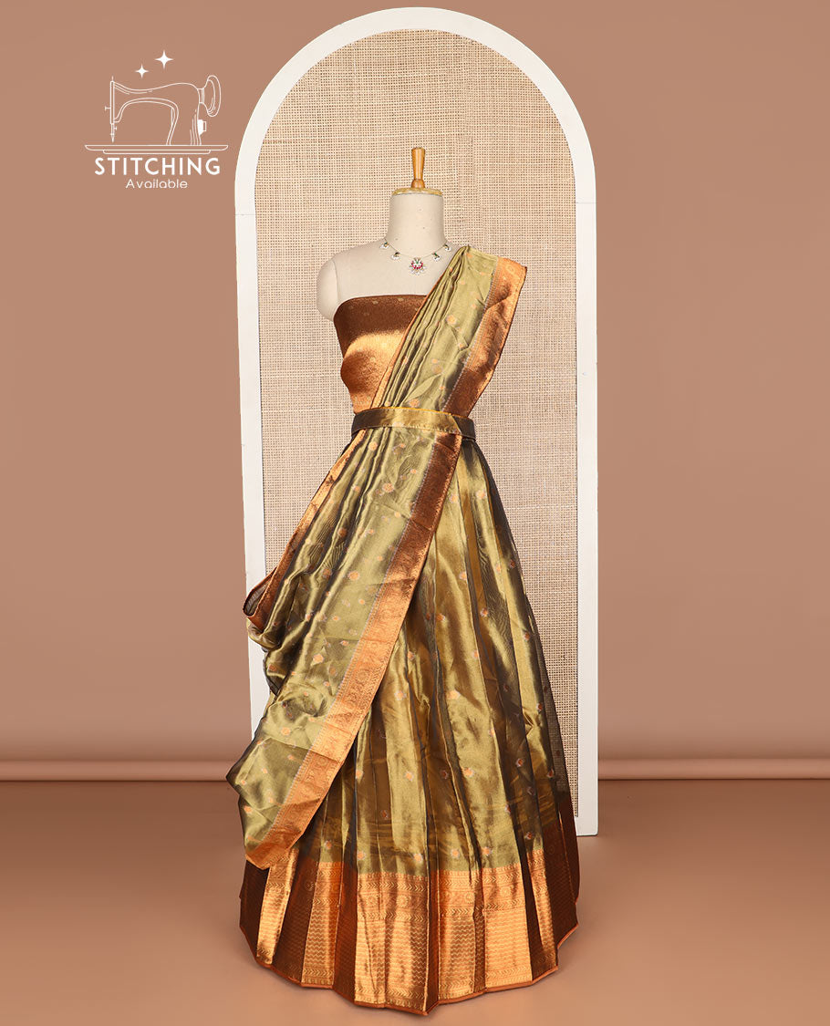 Brown buttas tissue half saree with contrast zari design border, floral design blouse & floral design dhavani