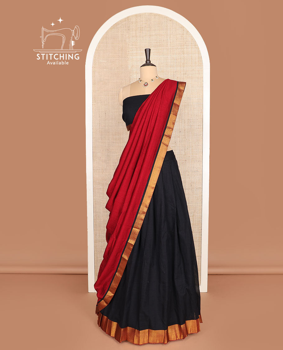 Black cotton half-saree, plain with zari bordered skirt, matching blouse, and a contrast zari bordered dhavani