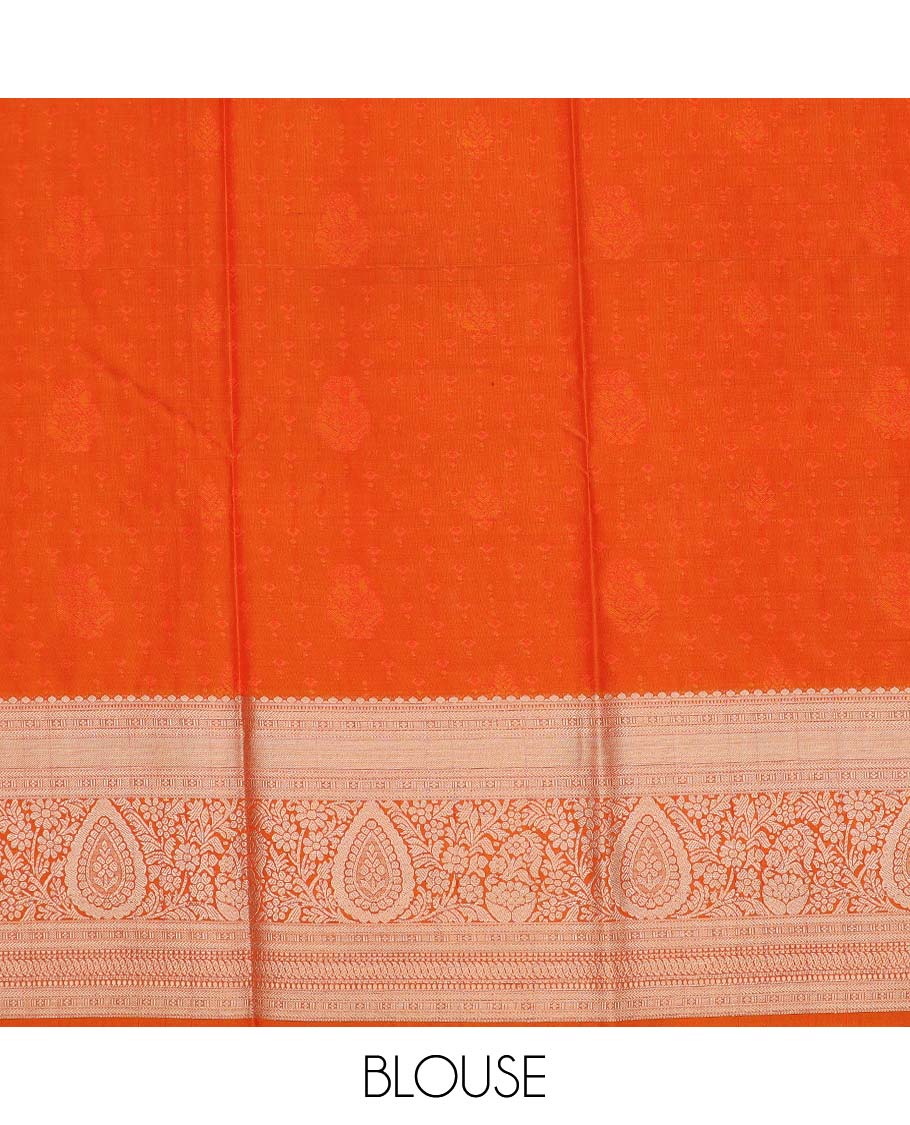 Orange art silk pavadai material, zari buttas with embossed contrast traditional zari border skirt, and matching blouse