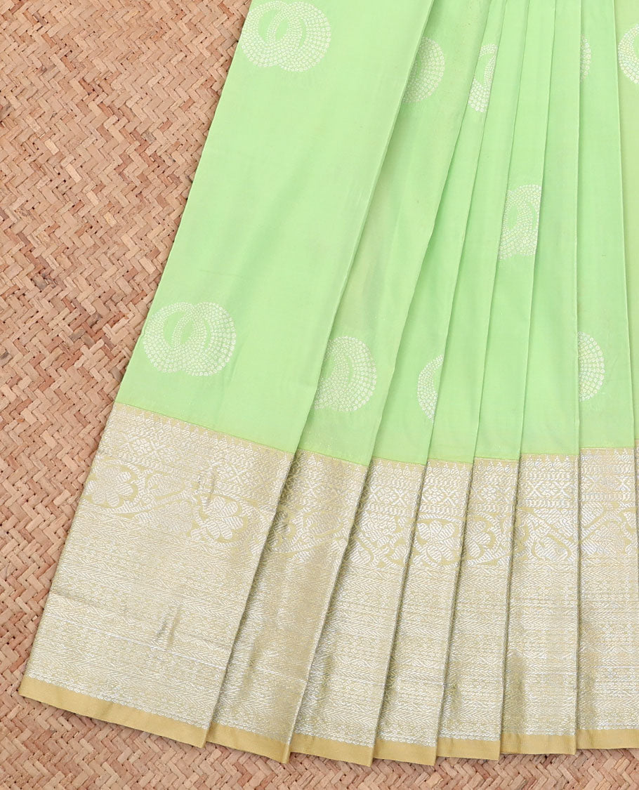 Green Budget Silk Saree, Subtly Sparkled with Buttas All Over Its Body, Complemented by a Contrast Traditional Zari Design Border, Grand Pallu, and Paired with a Contrast Blouse