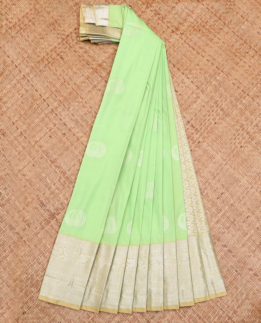 Green Budget Silk Saree, Subtly Sparkled with Buttas All Over Its Body, Complemented by a Contrast Traditional Zari Design Border, Grand Pallu, and Paired with a Contrast Blouse