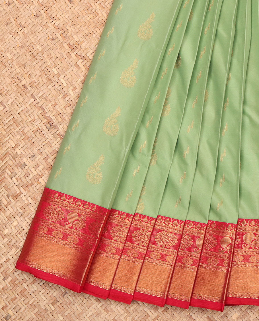 Green Budget Silk Saree Enthralled with Zari Buttas, a Contrast Traditional Zari Border, Intricate Pallu, and a Contrast Blouse