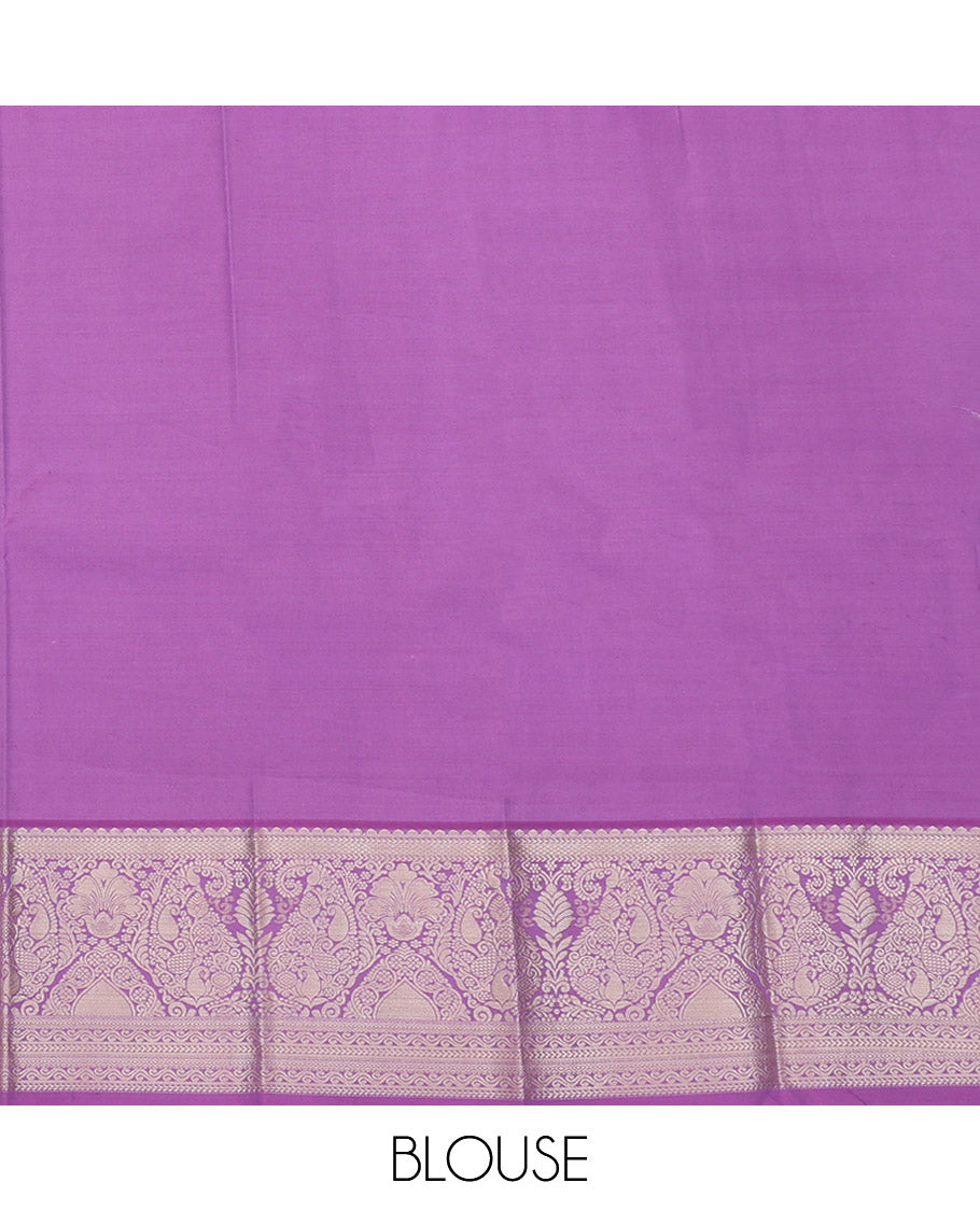 Orange Budget Silk Saree Artfully Detailed with Zari Stripes and Floral Buttas All Over Its Body, Complemented by a Contrast Traditional Zari Design Border, Pallu Opulently Embellished with Intricate Design, and Paired with a Contrast Blouse