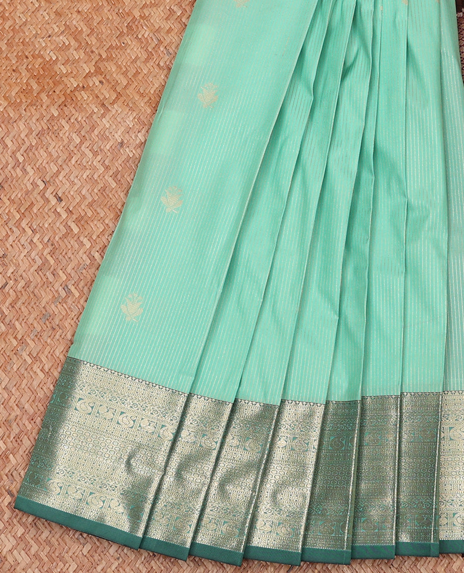 Pale Green Budget Silk Saree, Sparsely Sparked with Zari Buttas and Stripes All Over Its Body, Highlighted by Contrast Traditional Zari Designs Woven Border, Grand Contrast Jaal Pallu and Paired with a Contrast Blouse