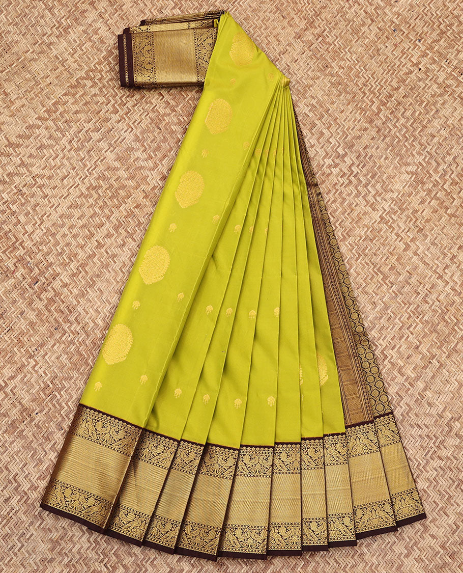 Green Budget Silk Saree, Subtly Sparkled with Zari Buttas All Over Its Body, Complemented by a Contrast Traditional Zari Border of Peacock Designs, Grand Jaal Pallu, and Paired with a Contrast Blouse