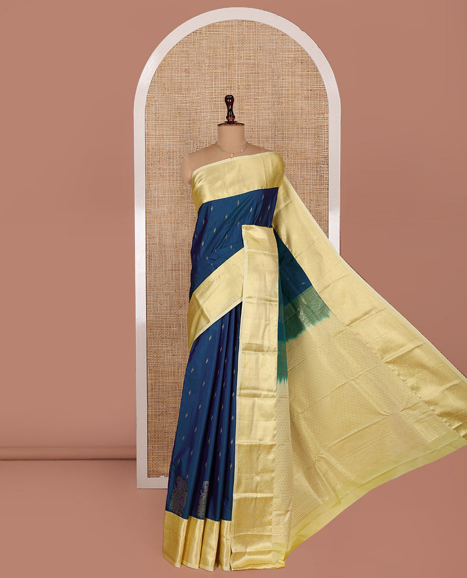 Blue Budget Silk Saree, Prettied with Zari Buttas and Corner Paisley Buttas on Its Body, Complemented by a Contrast Traditional Zari Designs Woven Border, Pallu of Geometric Designs, and Paired with a Contrast Blouse