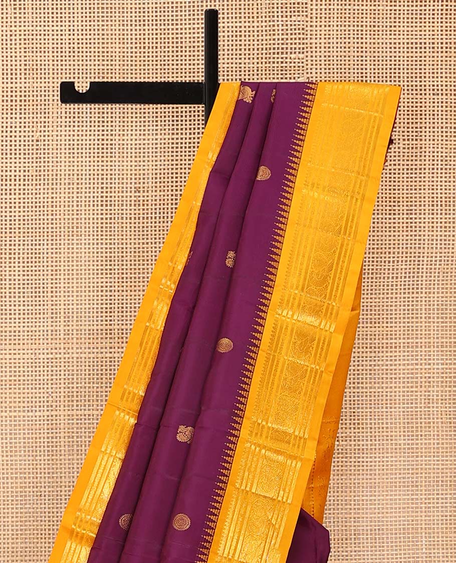 Purple peacock chakram buttas Bangalore silk saree, contrast temple traditional zari border, and pallu of traditional designs