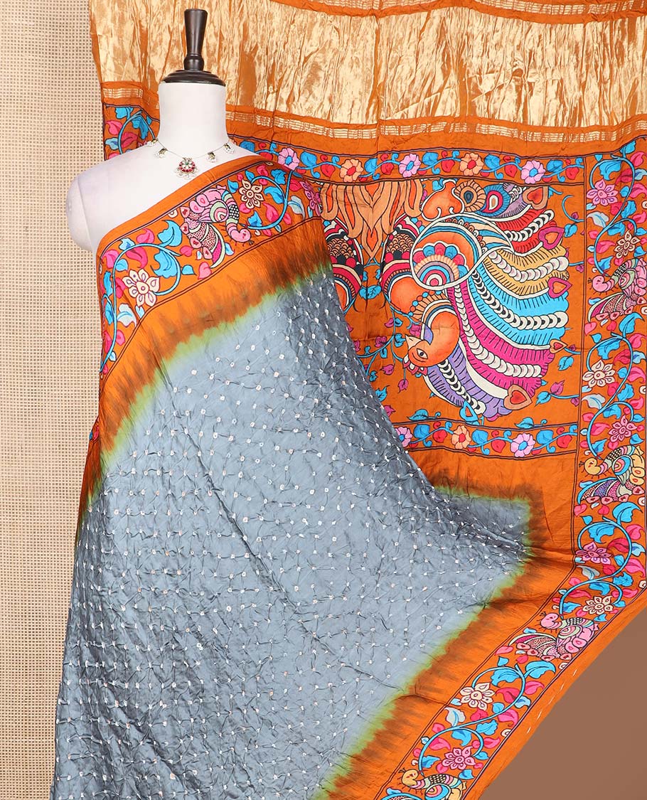 Grey bandhani dotted bandhani silk saree, contrast kalamkari floral vine and peacocks printed mustrad border of peacock printed pallu
