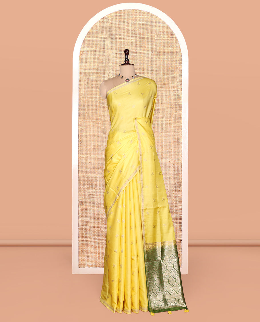Light Yellow Satin Silk Saree, Subtly Sparkled with Zari Buttas, a Subtle Piping Border, Complemented by a Contrast Intricately Designed Pallu, and a Contrast Blouse